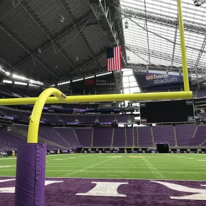 looking through football goal post at vikings stadium