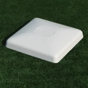 a TurfBase® baseball base sitting on a synthetic turf playing field
