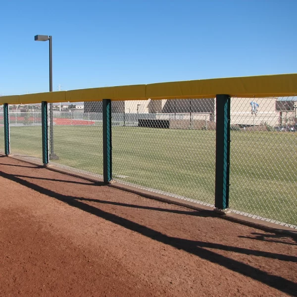 green post and yellow rail padding by sportsfield installed at ball field