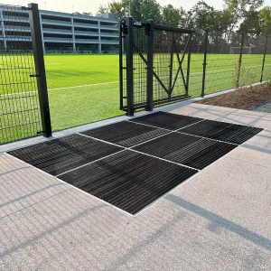 synthetic infill turf collection containment system for pedestrians and equipment installed along side a synthetic turf soccer field