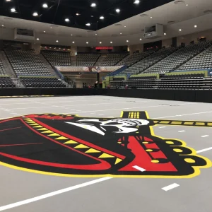 dasher board pads installed at an indoor football playing facility