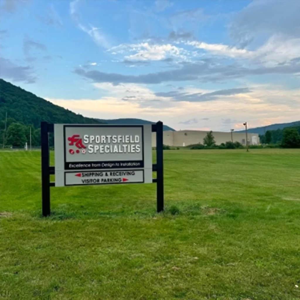 front of the deposit new york location with a sportsfield specialties sign