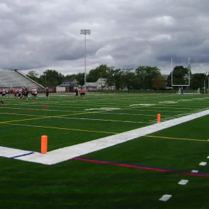 end zone pylons installed in the end zone of an outdoor athletic field