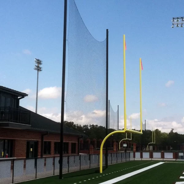 Football barrier netting installed behind a football goal post by Sportsfield Specialties