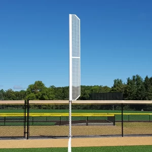 White foul pole with wing installed on a natural grass baseball field