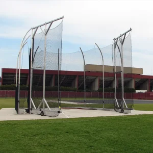 a hammer & discus throwing cage installed at a local high school with its doors open
