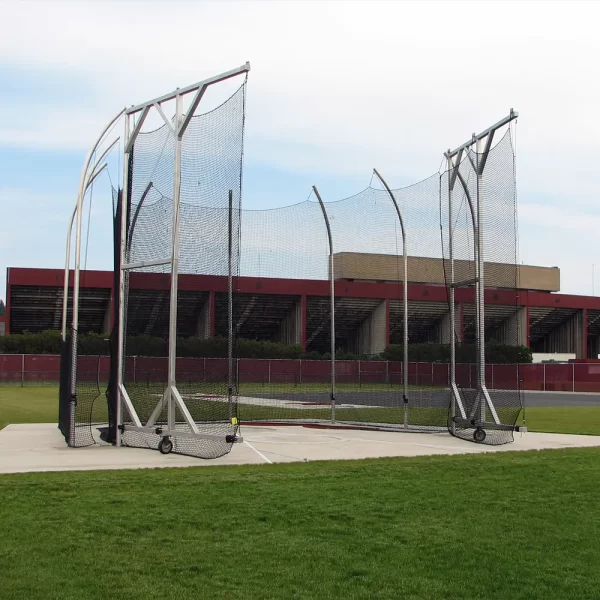 Hammer / Discus Throwing Cage on a concrete throwing surface with its doors open