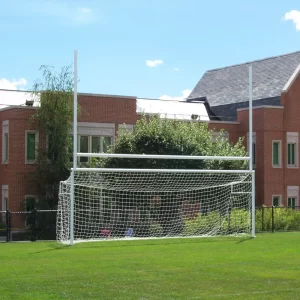 H-Style Combination Football / Soccer Goals installed at the end of a shared multi-use ball field