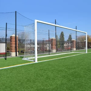 International soccer goal on the field in front of stormguard netting systems