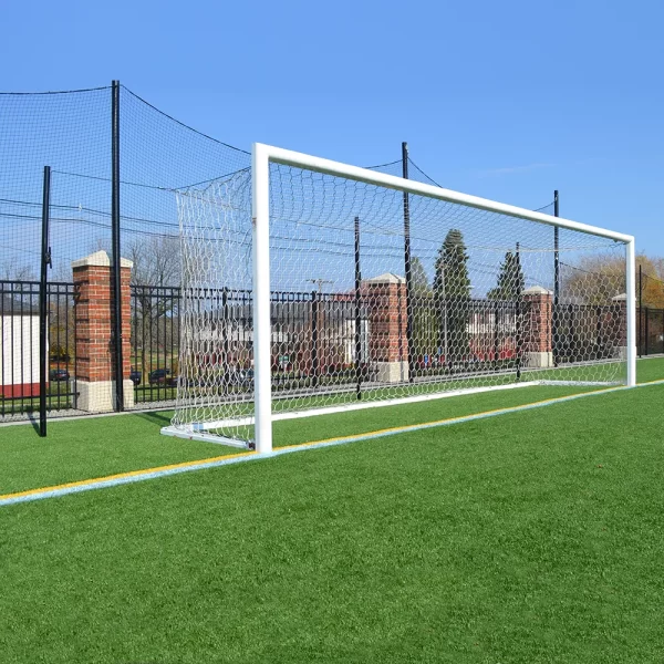 International soccer goal on the field in front of stormguard netting systems