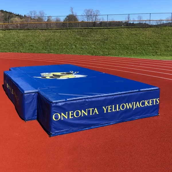 JumpZone® High Jump Landing Pad with custom digitally printed graphics installed at the Oneonta Yellow Jackets track & field