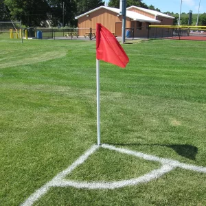 Kwik Goal® Corner Flag installed at the corner of a soccer field