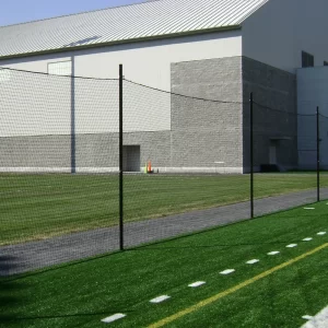 Lacrosse netting system by Sportsfield Specialties installed between fields at a multi-use playing field