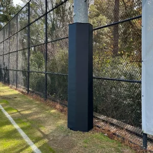 a black hexagonal pad installed around a light pole