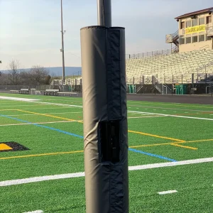 a netting system pole with protective padding installed