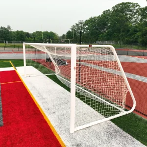 a regulation soccer goal installed at the end of a soccer field