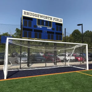 Regulation soccer goal on Bruggeworth Field in front of their scoreboard