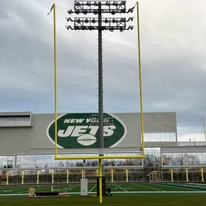 Rotating gooseneck hinged football goal posts upright on the NY Jets practice field