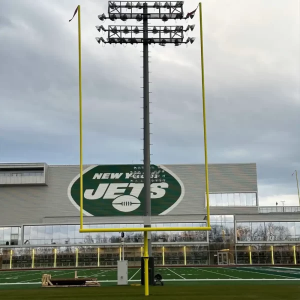 Rotating gooseneck hinged football goal posts upright on the NY Jets practice field