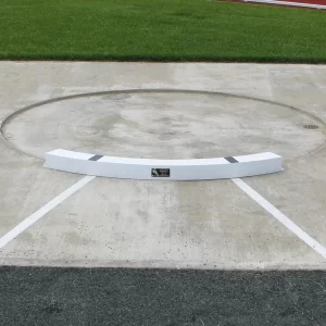 a Shot Put Toe Board installed on a shot put throwing surface ready for the big event