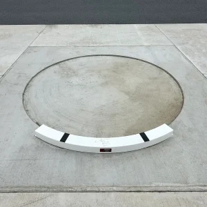 a shot put toe board installed in a throwing circle