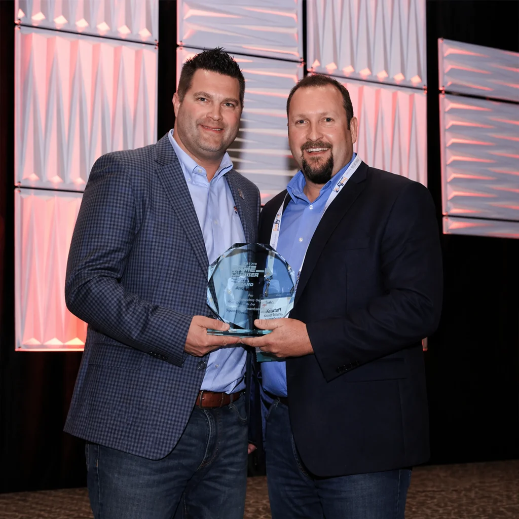 David moxley (left) accepting an ASBA game changer award