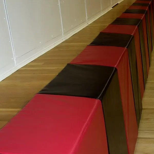 red and black vinyl stage mats installed by sportsfield specialties