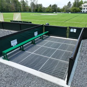 a synthetic turf infill collection containment system installed at the entrance of Cardigan Mountain School
