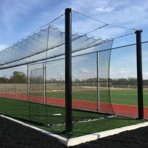 Tension Batting Tunnels on synthetic turf next to a baseball field