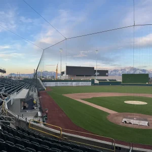 tie back tension netting system installed between the stands and the baseball playing field