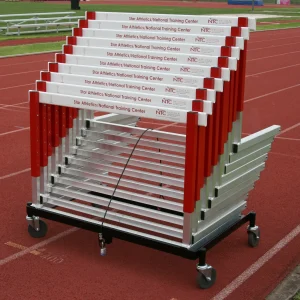 track hurdle cart with 10 l-shaped hurdles ready to be rolled off the track