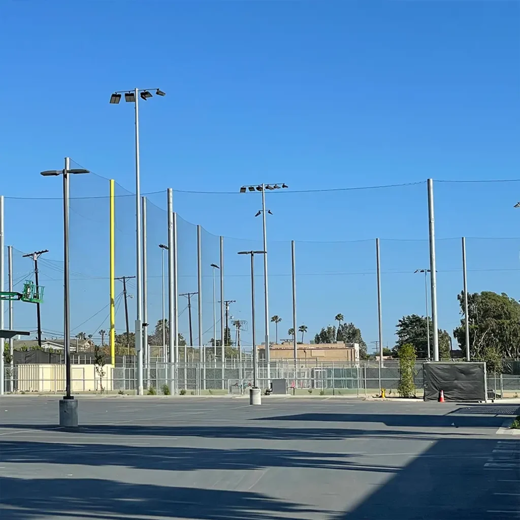 a 90' tall netting system installed at Venice high school in Los Angeles