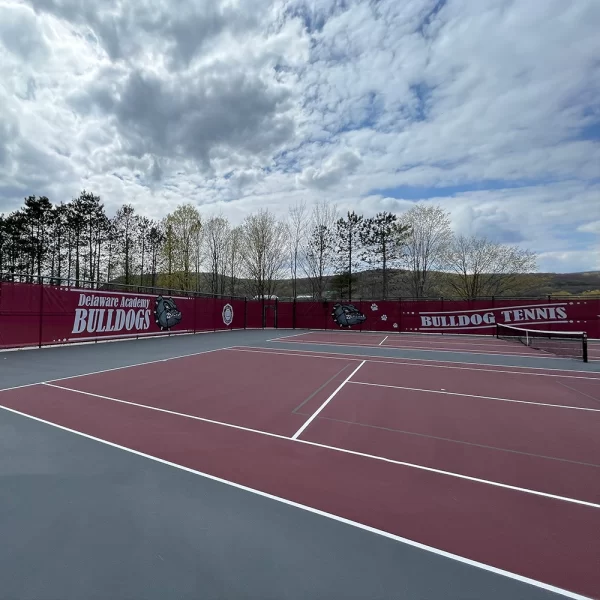 Windscreen with digitally printed graphics by sportsfield specialties installed at Delaware Academy